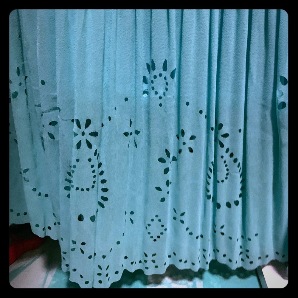 Laser cut pleated skirt